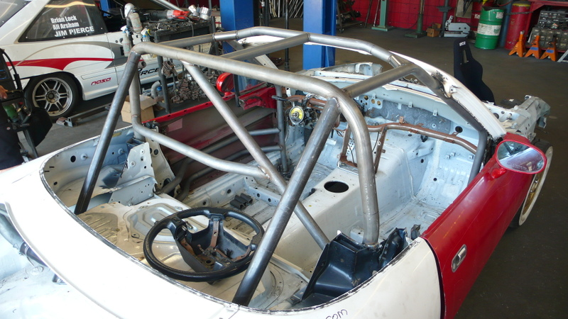 Illustration for article titled Eyesore Racing's Ghettocharged Miata Fears No Turbocharged Peugeot Surrender Monkeys!